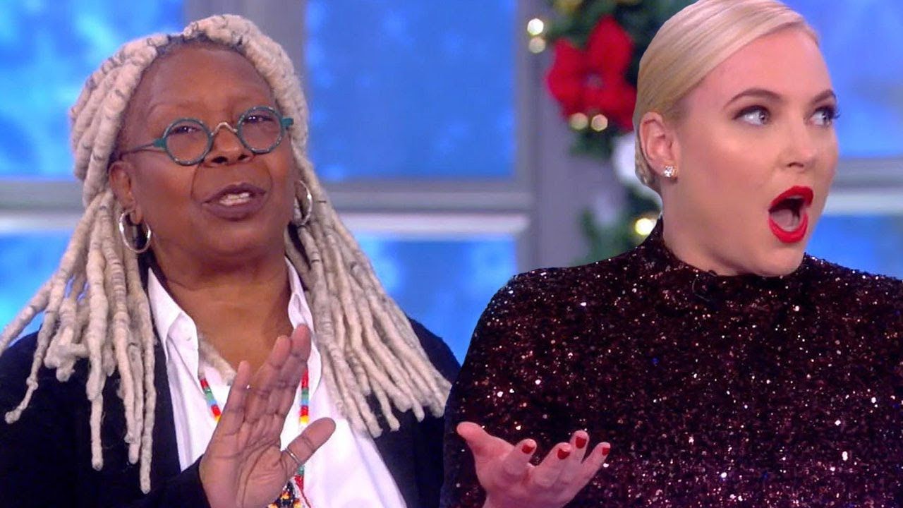 Whoopi Goldberg gesturing at Meghan McCain during a heated discussion on "The View"