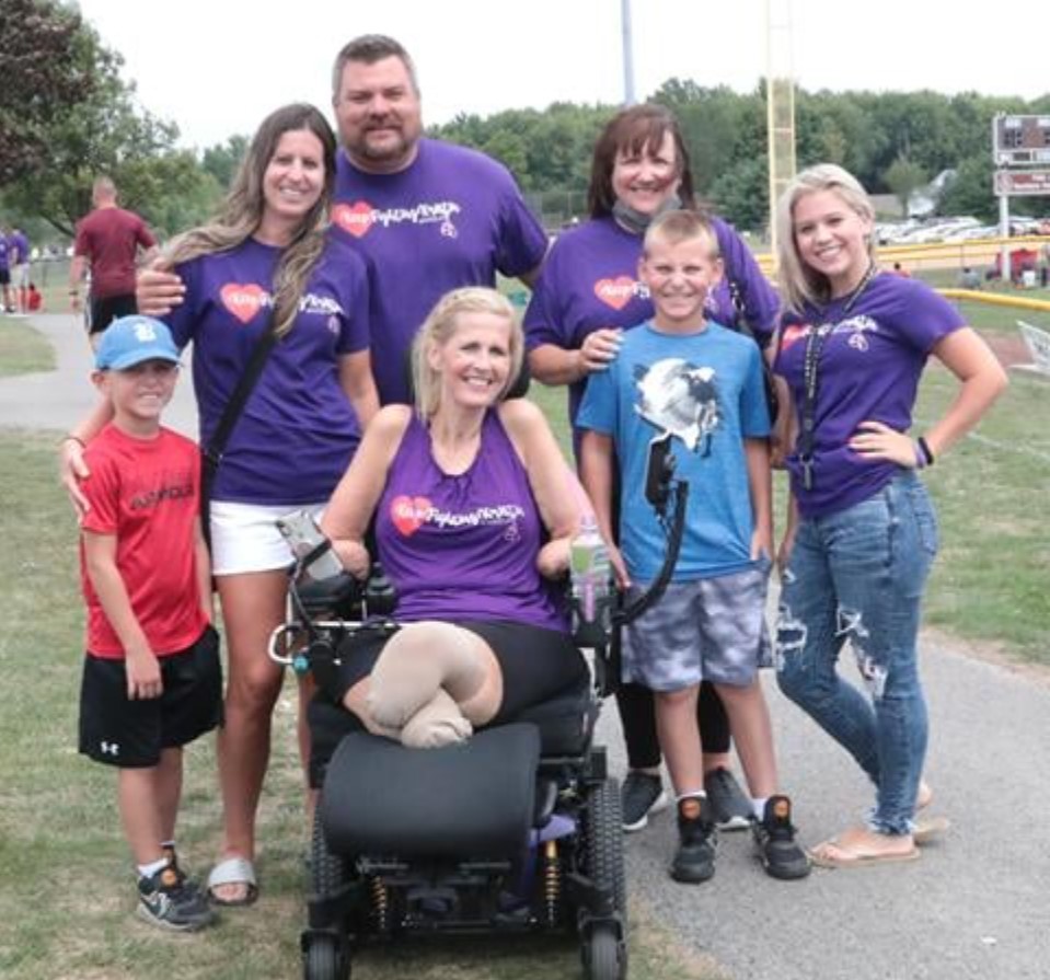 Kristin Fox with family and friends at a charity event