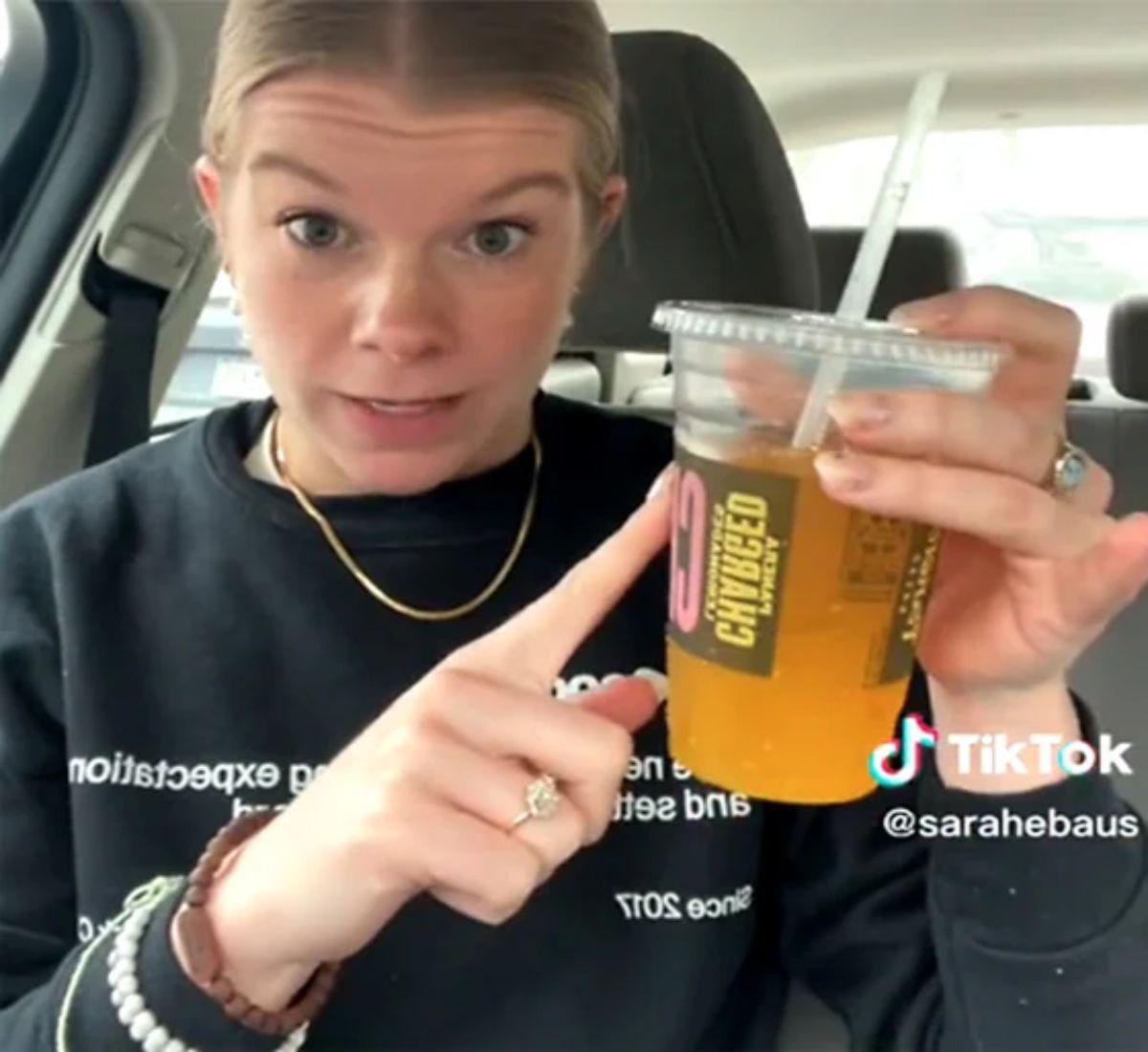 TikTok video shows a lady holding Panera’s charged Lemonade drink