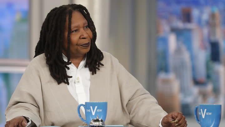 Whoopi Goldberg and two cups with The View logo