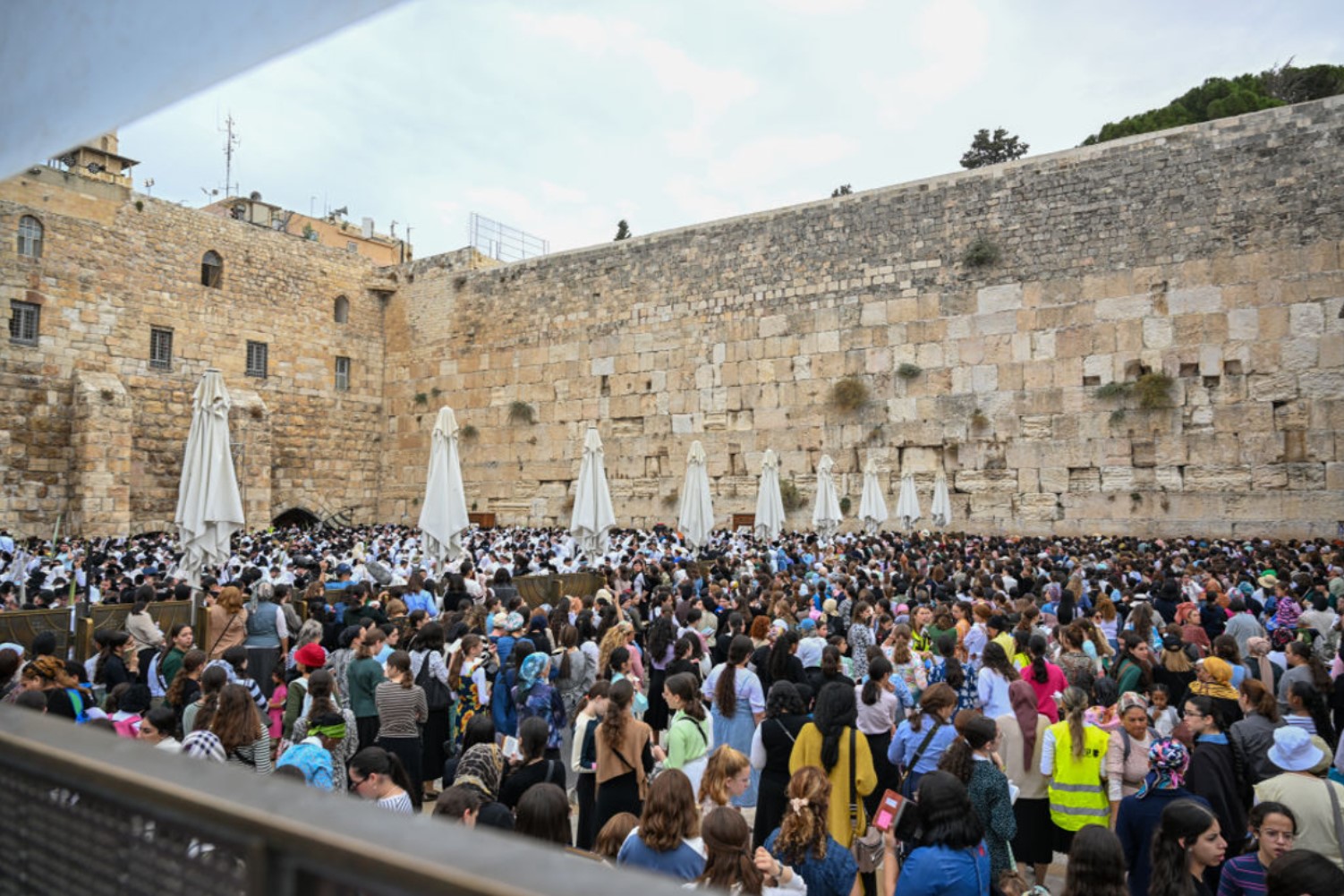 Jewish men and women come together to recite prayers in Jerusalem, IsraelPanorama view of the Western Wall in Jerusalem