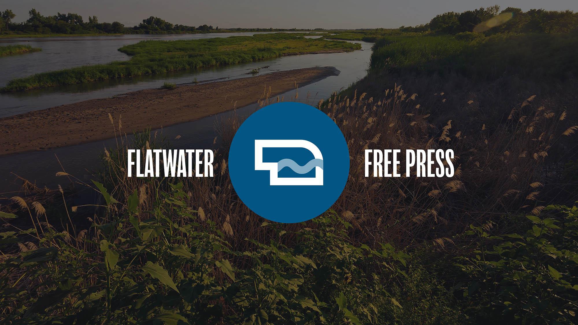 Flatwater Free Press logo in front of a river