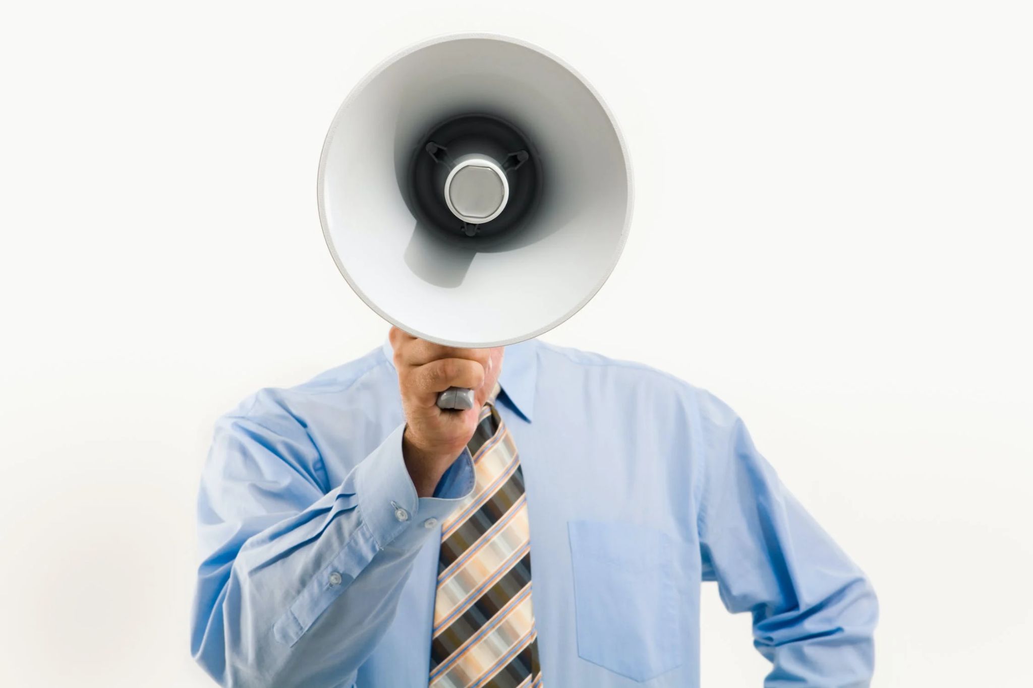 Man holding megaphone against white background